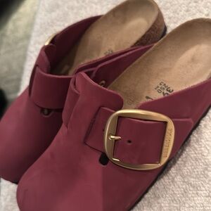 Birkenstock clogs with gold buckle